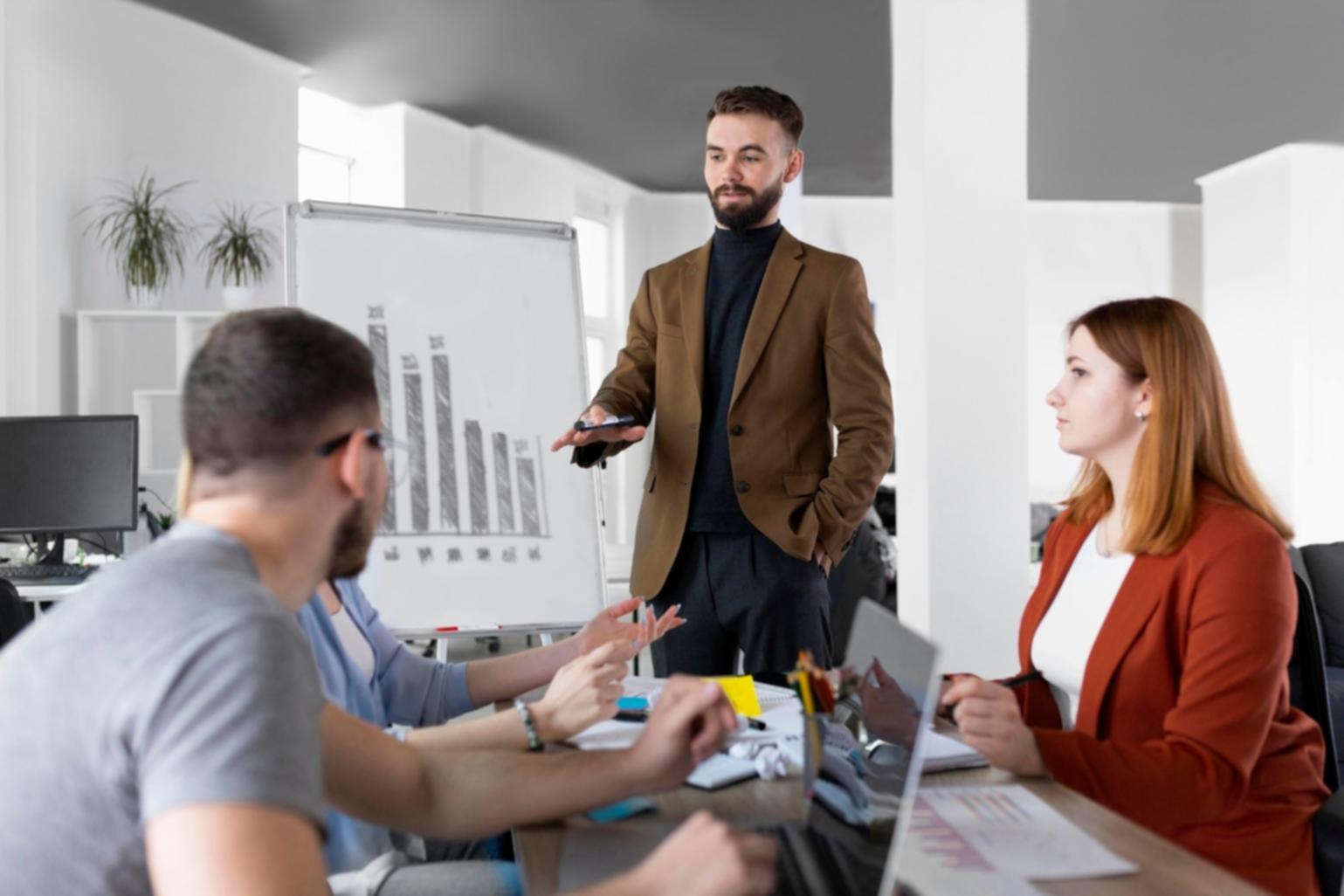 Professionelles Meeting zur Besprechung von Budgetabweichungen mit Finanzdiagrammen